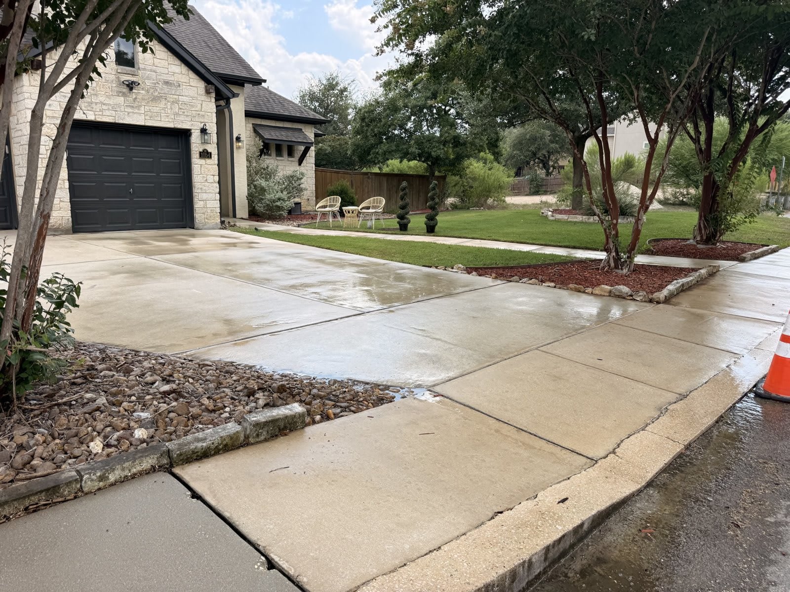Freshly pressure-washed driveway at a San Antonio area home